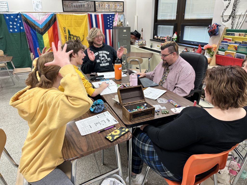 Students gather in Mr. Lantz’s classroom to create characters for their new Dungeons and Dragons campaign.